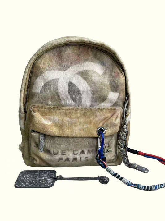 Chanel No War canvas graffiti backpack