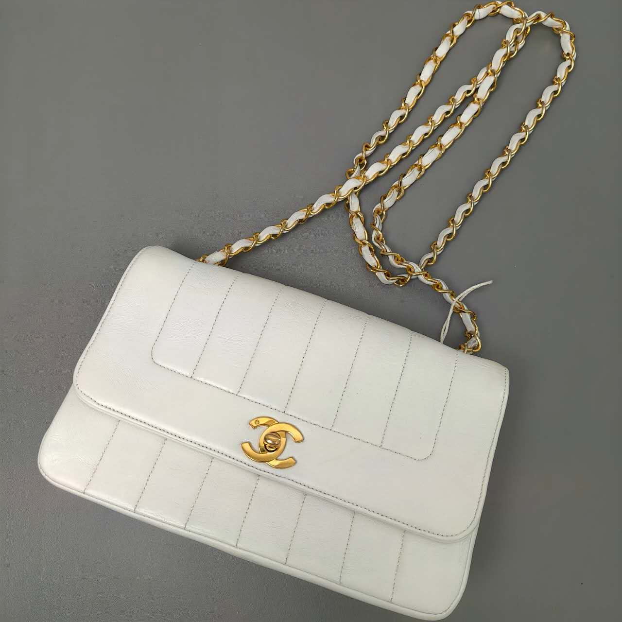 Chanel Vertical Quilted Flap Bag in White Leather