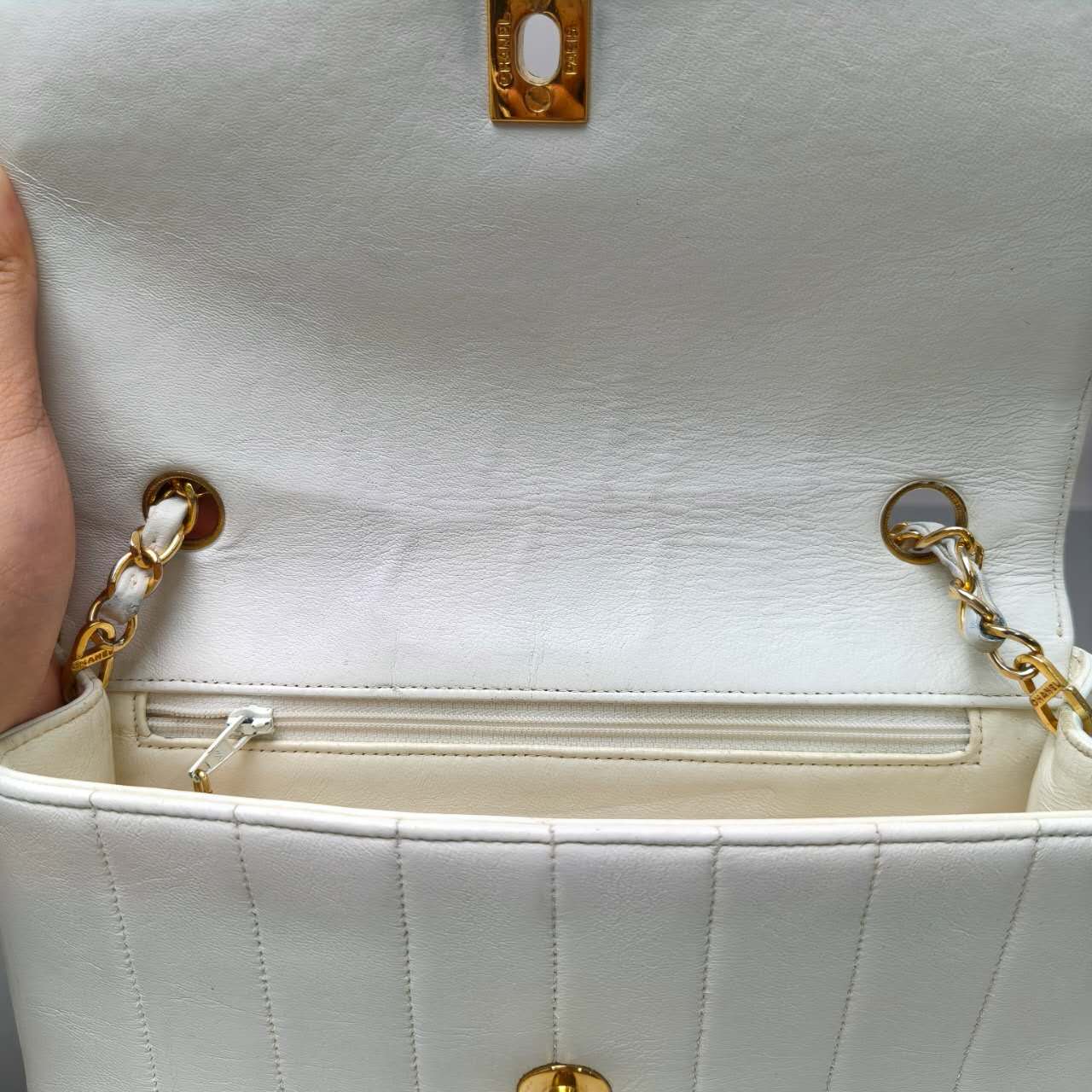 Chanel Vertical Quilted Flap Bag in White Leather